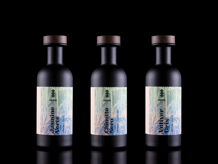 3-bottles-black-bacground-closer-together_web